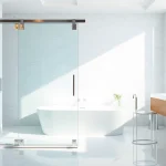 Elegant shower sliding doors in a modern bathroom, showcasing luxury and style.