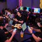 Players enjoying the EE88 gaming experience in a vibrant lounge, showcasing excitement and camaraderie.