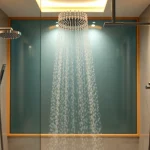 Experience relaxation with elegant showers showcased in a luxurious bathroom setting.